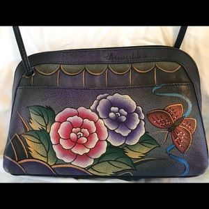 ANUSKA PAINTED PURSE. Navy with beautiful flowers.
